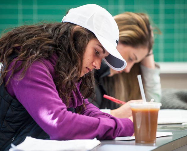 Student taking notes