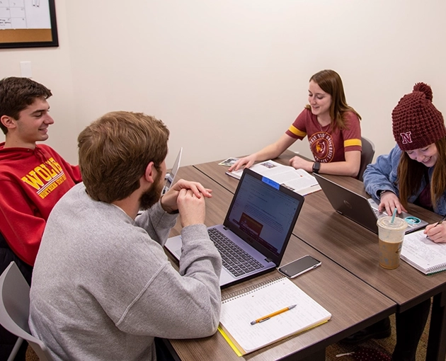 Students Studying at a Table