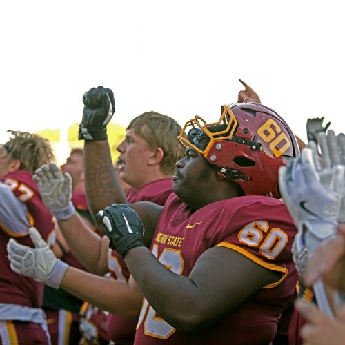 Isaac Johnson with the football team