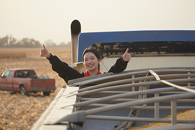 International student on a grain truck