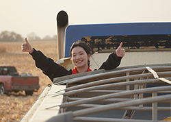 Exchange student rides in grain truck