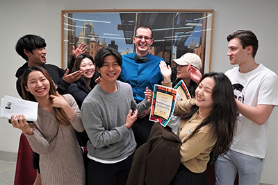 A group of international students take a silly photo
