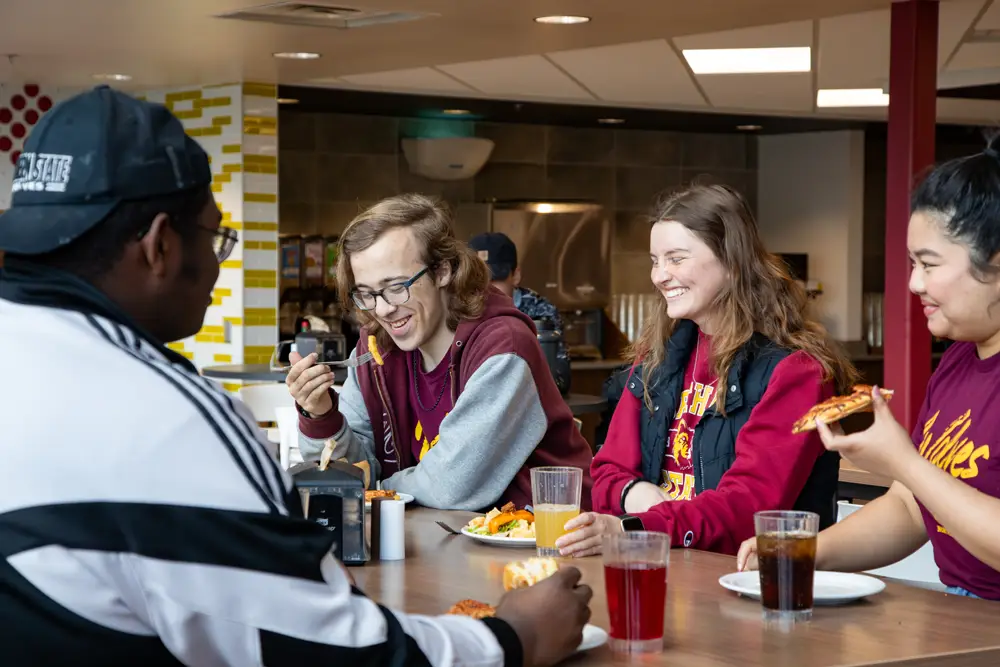 Students eating at the Wolves Den Dining Center