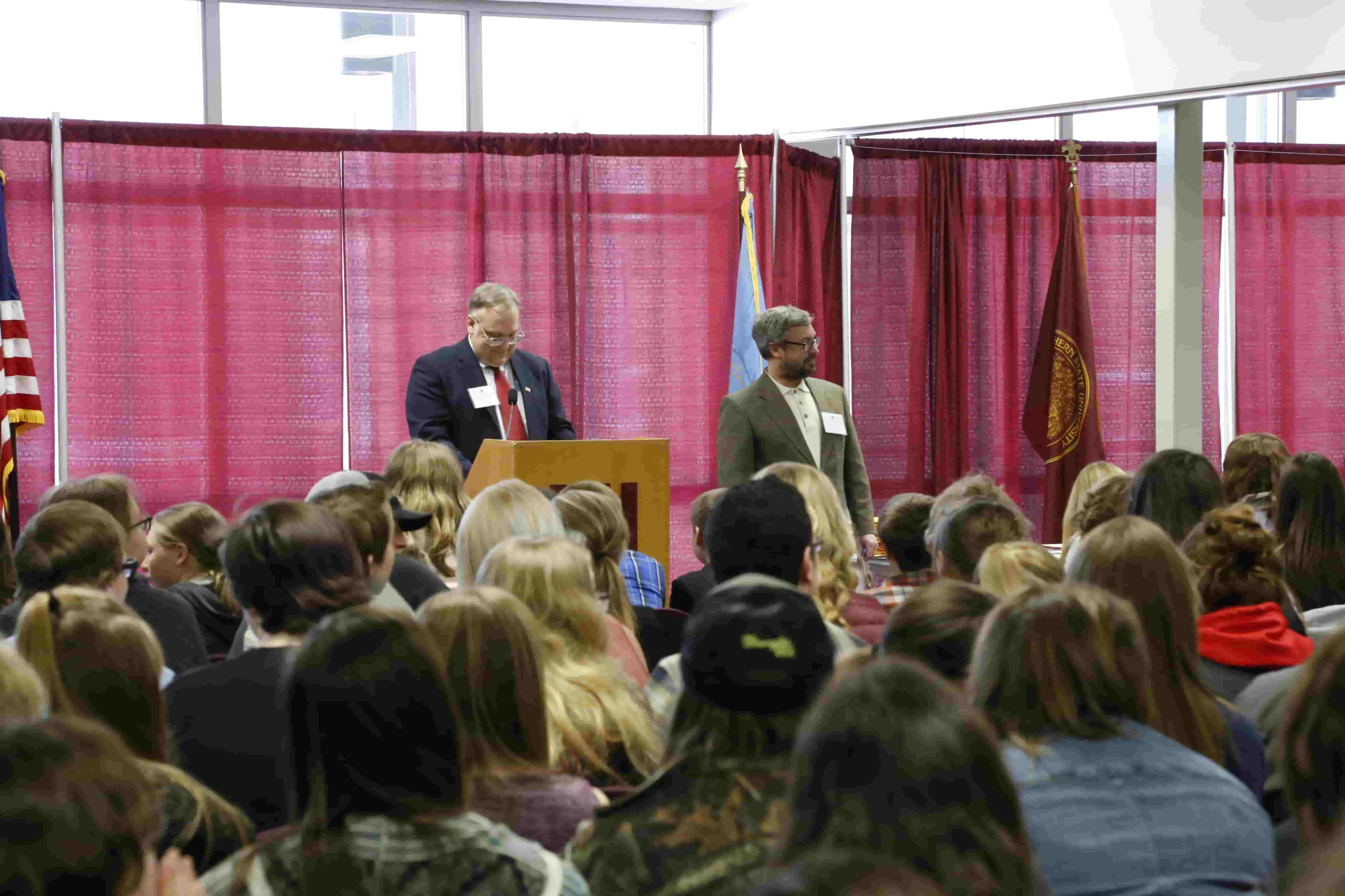 Professors at podium at National History Day