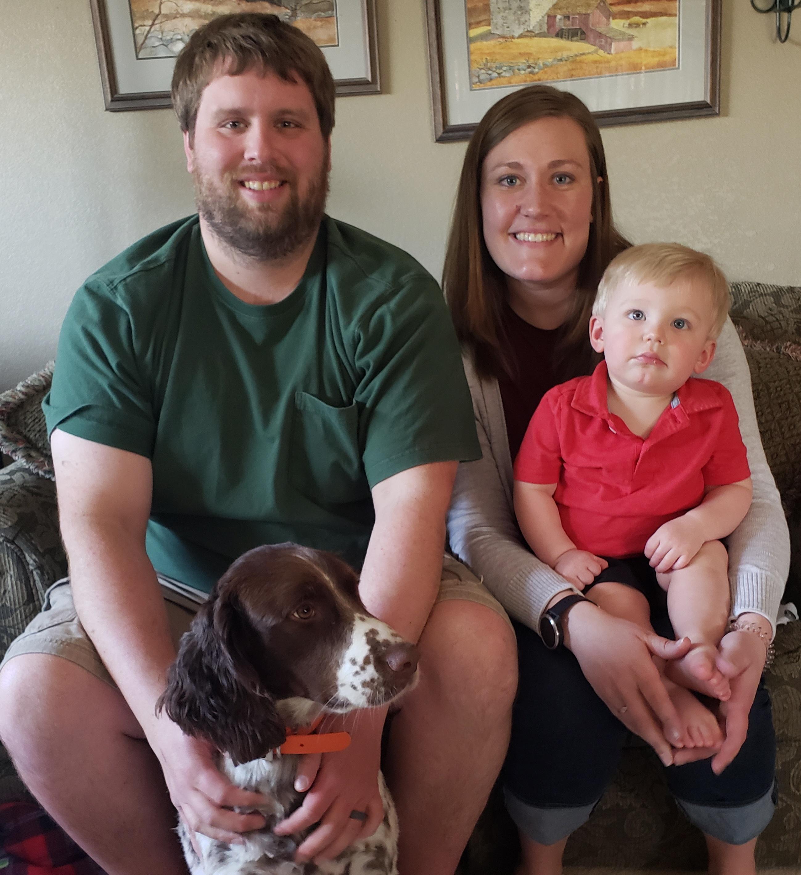Photo of Rachel Rieger, her husband, son and dog