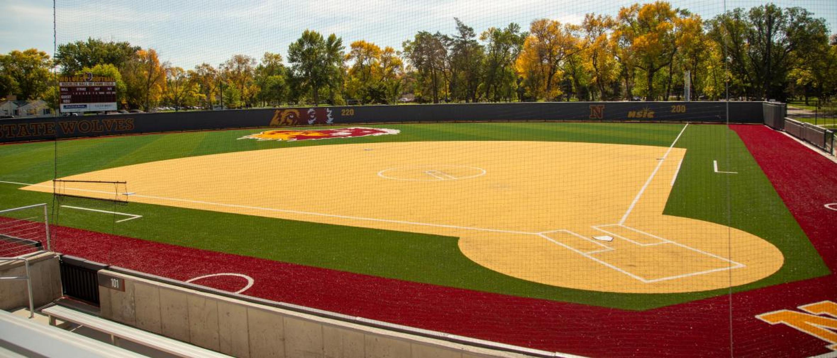 Kohler Softball Field with trees in background on sunny day