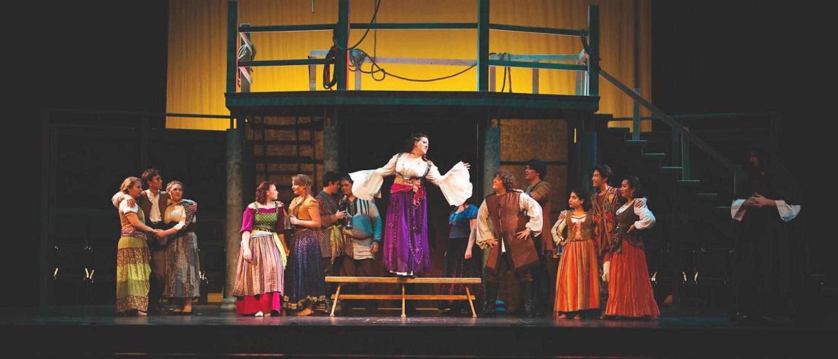 Students performing play on stage