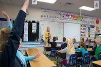 Student teacher in a classroom of young children
