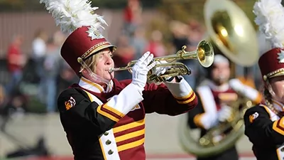 A Marching Wolves member plays trumpet
