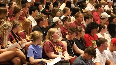 New NSU students sit in an auditorium