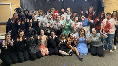 Students in Halloween costumes