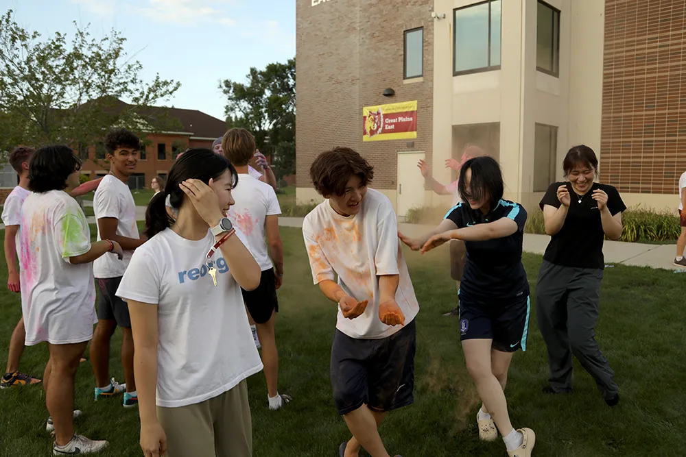 International students play color dodgeball