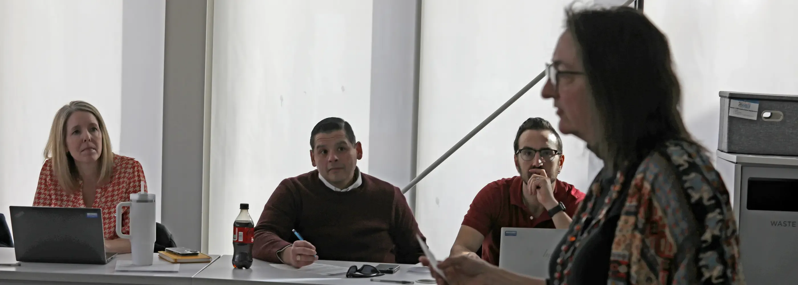 Professor teaching in front of a class of students