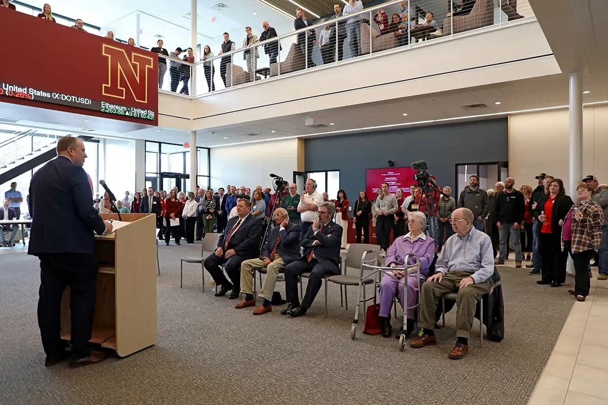 President LaFave speaking in the lobby of the the Business and Health Innovation Center to a crowd at the ribbon cutting ceremony