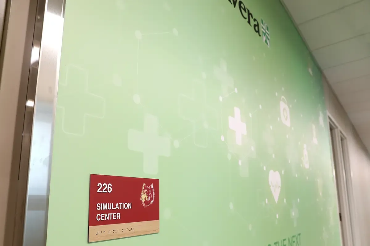 Door sign to the Simulation Center