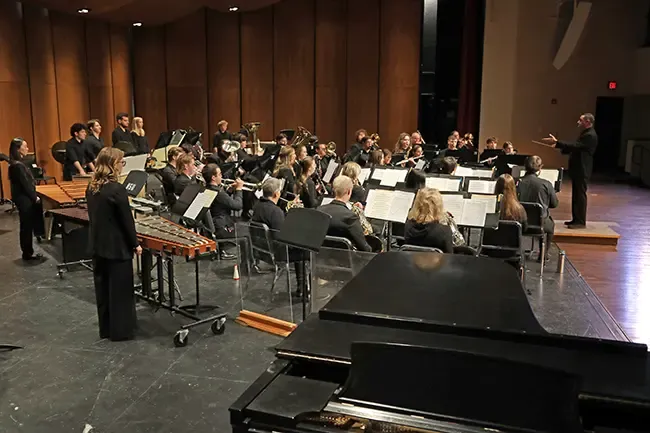The Northern State University Symphonic Band prepares to play at an April 2026 concert.