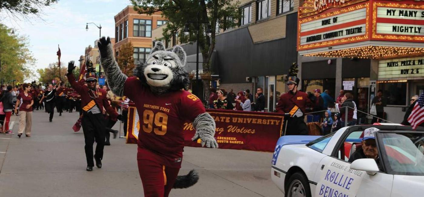 Thunder leads the Marching Wolves down Aberdeen's Main Street during the Gypsy Day Parade