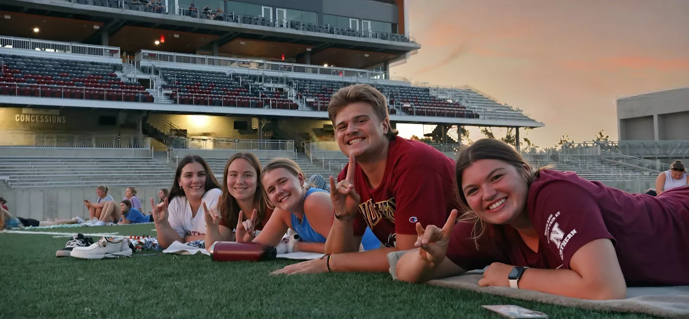 Students on a football field