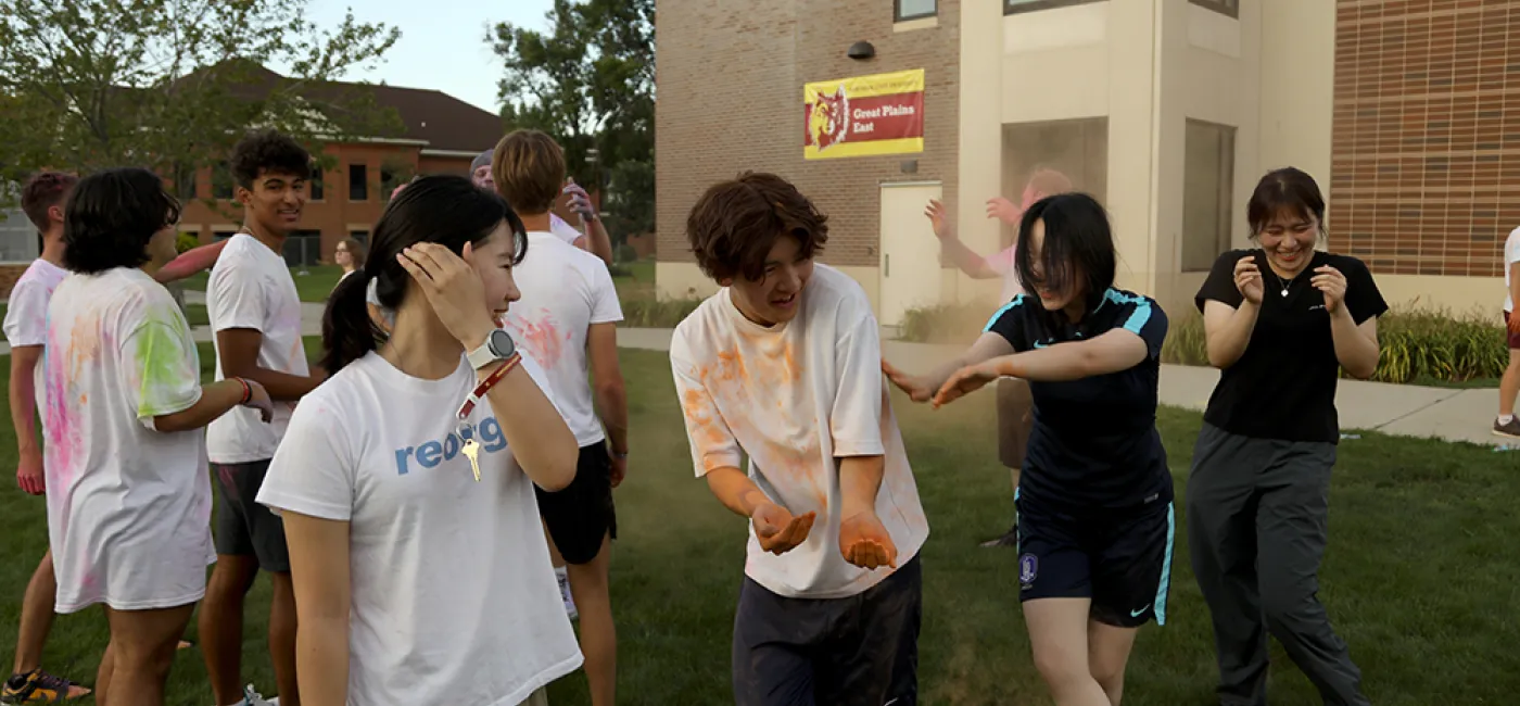 International students play color dodgeball