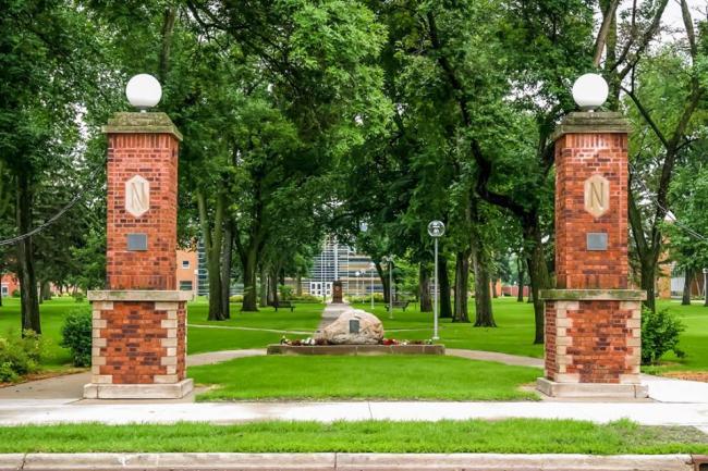 View of campus green with pillars