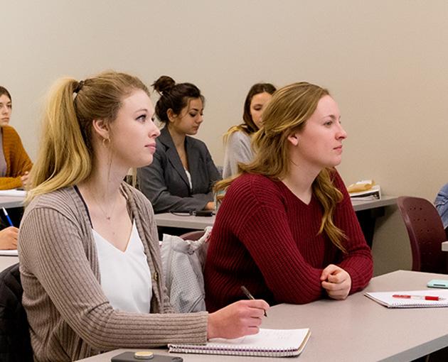 Students listening to lecture in classroom