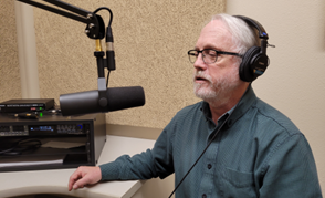 Dr. Ken Blanchard recording the new Wolftrax podcast at NSU