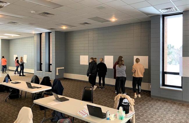 Previous Huron Community Campus cohort on a gallery walk 