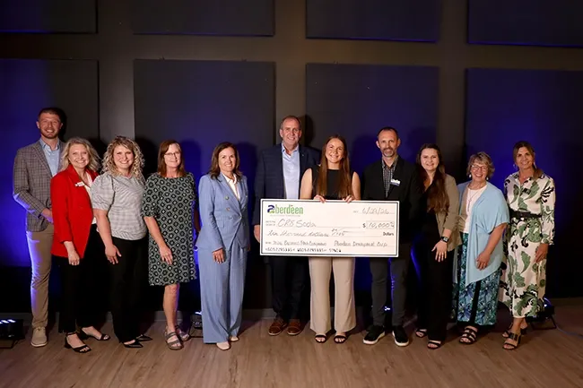 Entrepreneur Madi Jones and panel of judges