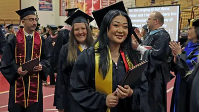 NSU Graduates passing by NSU Faculty Receiving Line